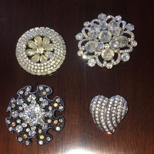 Rhinestone pins.